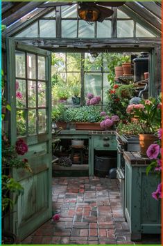 an open greenhouse with potted plants and flowers in the kitchen area, surrounded by brick flooring