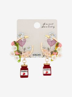 <div>Keep your jewelry lineup super sweet with these hoop earrings! These gold-tone hoops have strawberries and flowers embedded around the outside and a mouse hanging out inside the hoop  holding onto drop charms of strawberry jam jars.<div><div><ul><li>1 12""<li><li>Nickel-free zinc; steel; plastic; glass<li><li>Imported<li><ul><div> Party Icon, Detailed Jewelry, Floral Hoops, Jam Jar, Strawberry Jam, Super Sweet, Accessories Jewelry Earrings, Hot Topic, Glass Set