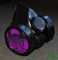 Cyber Mask made from PVC and plastic .   Gas Mask has inserts in the shape of a violet Biohazard , Inserts a removable easy  D = 2.76 inch. (70 mm)  .   Cyber Goth Mask adult sized. An adjustable elastic band long and strong for easy fit and comfort on anyone. You can choose additional other biohazard , radiation , skull symbols by adding it from my other listing : https://www.etsy.com/listing/1741175014/biohazard-simbol-biohazard-inserts-cyber?click_key=2f9ef91c13e1e2540e1d76a4f61d7aeff83446ba%3A1741175014&click_sum=7b7078f8&ref=shop_home_active_2  Modified for easy breathing. All modification are made by hand ! Hi quality, by ZHOS ! Item new without tags. Good for fashion , festivals, parties, cyber gothic look, like gift .              Item will come to you well packed Shipping: We ship E Girl Fashion, Goth Mask, Gothic Mask, Cosplay Mask, Fashion Masks, Gothic Looks, Organic Glass, Black Punks, Cool Masks