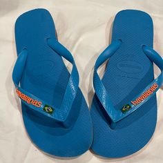 Brand New Beautiful Blue And Orange Flip Flops. Great For The Pool! Mens 9 Women’s 11 Really Unisex Casual Blue Flat Flip Flops, Blue Slip-on Casual Flip Flops, Blue Casual Slip-on Flip Flops, Casual Blue Slip-on Flip Flops, Casual Blue Flip Flops, Orange Flat Flip Flops Casual Style, Orange Casual Flat Flip Flops, Casual Orange Flat Flip Flops, Blue Sporty Flip Flops For Vacation