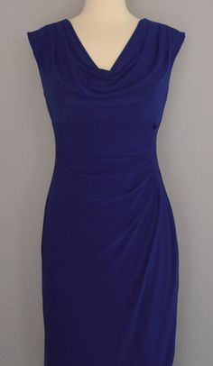 Gorgeous Ralph Lauren navy blue jersey day dress. Medium weight navy blue polyester blend jersey dress hugs the body for a flattering fit. Draped neckline as pictured. Ruched at the left side creating a lovely draped look as pictured. Pulls on over the head - no zippers or buttons. Completely lined with soft polyester jersey. DESIGNER LABEL: Lauren Ralph Lauren CONDITION: Excellent. There is no discoloration, fading, snags, picks, holes, stains, rips, or other issues. SIZING: Tagged a vintage size 8. Based on the measurements below this would best a modern size Small to Medium depending on how you like your fit. MEASUREMENTS:Shoulders: 18" Across Bust: 35-1/2" Natural Waist: 29" Hips: 40"Length: 42-1/2" - Top of Shoulder to Bottom Hem Skirt Bottom Sweep: 39" Around A gorgeous dress perfect Blue Fitted Dress With Gathered Neckline, Fitted Blue Dress With Gathered Neckline, Blue Ruched Elastane Dress, Jersey Day, Draped Neckline, Blue Jersey, Ralph Lauren Shop, Date Dresses, Designer Label