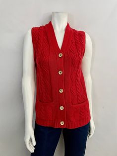 "Vintage 70's Boho, Virgin Wool, Sleeveless, Cardigan (S) This Ladies 70's Cardigan comes in a Red-Orange Virgin Wool and is Sleeveless with a Deep V Neckline and has Five Front Button Closure with Two Front Pockets and has a Cable Knit Weave. 100% Virgin Wool Made in Hong Kong *This Cardigan Sweater is in Excellent Condition. Size: (S) Modern Day 4 Bust: 34\"-36\" Length: 26\" Shoulder to Shoulder: 14\" (outside edges) Weight: 15 oz *Follow FreshandSwanky on Instagram" Orange Sleeveless Winter Vest, Winter Orange Sleeveless Vest, Casual Orange Sleeveless Sweater Vest, Orange Sleeveless Top For Winter, Retro Sleeveless Sweater Vest For Fall, Retro Red Sleeveless Vest, Red Sleeveless Retro Vest, Vintage Sweater Vest For Fall, Vintage Red Sweater Vest For Fall