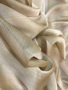 an up close shot of a beige fabric