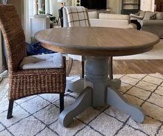 a dining room table with chairs around it