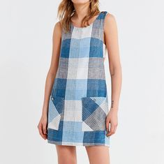 New With Extra Button Tags, Brand Label Marked. It Doesn't Get Any Easier Than This Linen Shift Dress From Urban Outfitters. Made From A Checkered Linen In A Relaxed-Fit, Shift Silhouette. Topped With A Scoop Neckline + Thick Shoulder Straps That Lead To An Open Back. Finished With Cut-In Sides, A Hidden Side Zipper + Button Closure Pouch Pockets At The Hips. 55% Linen, 45% Rayon 100% Rayon Lining Machine Wash Tagged A Size Xs. Casual Blue Mini Dress With Pockets, Blue Summer Dresses With Pockets, Blue Cotton Dress From Urban Outfitters, Blue Cotton Dresses By Urban Outfitters, Blue Sleeveless Mini Dress With Pockets, Urban Outfitters Blue Cotton Dress, Blue Shift Mini Dress For Summer, Fitted Blue Linen Mini Dress, Urban Outfitters Blue Cotton Mini Dress