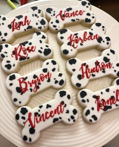 decorated cookies with dog bone and name on plate