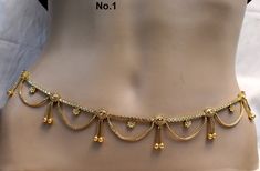 * Beautifully designed gold color belly chain. * can be used with belly dance costumes and saris. * D.no.1- Adjustable from32 to 40 inches Waist. * D.no.2- Adjustable from 32 to 40 inches Waist. * D.no.3- Adjustable from 32 to 40 inches Waist. * D.no.4- Adjustable from 24 to 36 inches Waist. Festive Waist Chain For Festivals, Bohemian Gold Body Chain For Wedding, Festive Elegant Gold Waist Chain, Gold Waist Chain For Party And Festivals, Gold Waist Chain For Festivals And Parties, Gold Kamarband, Indian Jewelry Simple, Bollywood Style Gold Waist Chain For Wedding, Elegant Gold Waist Chain For Festivals