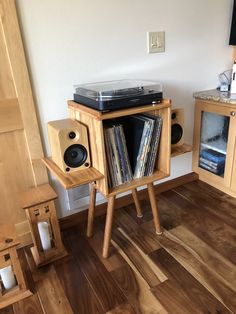 there is a record player in the corner of this room