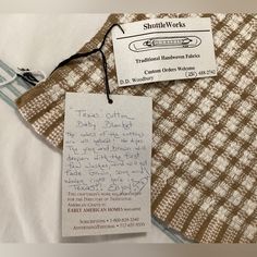 a piece of clothing with a note attached to it