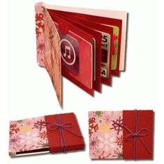 three red folders with different designs and ribbons tied around the edges, each containing an album