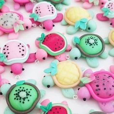 there are many different shaped cookies in the shape of turtles and watermelon slices