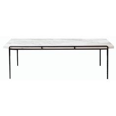 a white marble top coffee table with black metal legs