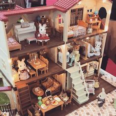 a doll house with all the furniture and accessories