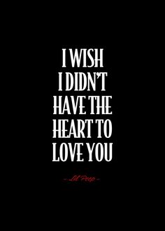 i wish i didn't have the heart to love you quote on black background