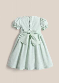 Created with love and attention to detail, this Green Gingham Embroidered Bunny Dress is designed to make your baby girl stand out. Made from lightweight fabric, it ensures she stays comfortable and free to play all day long. Featuring a delightful, embroidered bunny on the bib front bodice, this dress combines style and charm effortlessly. Whether it's a family gathering or a playdate with friends, this dress is the perfect choice for your little one's stylish wardrobe. - Perfect for any time of the year, for pictures, Child Portraits - True to size, about knee length. - Pink poly/cotton - Machine wash delicate cycle or hand wash and line dry. Cotton Puff Sleeve Playtime Dresses, Gingham Cotton Smocked Dress With Short Sleeves, Cute Smocked Puff Sleeve Dress, Cotton Puff Sleeve Dresses For Playtime, Cotton Dress With Smocked Back For Playdate, Spring Cotton Smocked Dress For Playtime, Puff Sleeve Playtime Dress For Spring, Spring Playtime Puff Sleeve Dress, Spring Puff Sleeve Playtime Dress