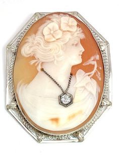 "Lady's vintage cameo pendant. Beautifully carved shell cameo is set in a filigree frame and features a diamond necklace, known as a \"habille\" cameo. They were popular in the 1800's.  The round cut diamond weighs approximately .12 ct. This piece weighs approximately 12.4 grams and tested 14K. It is in very good condition and would make a beautiful addition to your vintage jewelry collection." Heart Necklace Diamond, Cameo Jewelry, Vintage Cameo, Carved Shell, Cameo Brooch, Cameo Pendant, Gold Filigree, Art Deco Diamond, Gold Hands