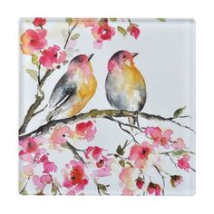 watercolor painting of two birds sitting on a branch with pink and yellow flowers in the background