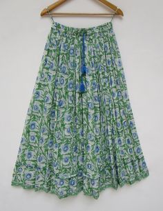 "ITEM DESCRIPTION blue green cotton hand block printed Indian long maxi skirts - summer season women maxi skirts Material: 100% cotton cambric soft crinkled fabric Length: - 38 inch long Waist :-28.00 inch full (14 inch half) 28 inch relaxed can stretch up to 50 inch Size: free size (fit to all) PRODUCT NAME: - Long Women Maxi skirts Ladies Vintage Long skirts Company Return Policy: Please write for more information to my email directly CHOOSE \"ASK SELLER QUESTION \" payment policy:- we accepts