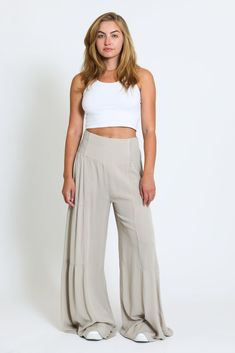 DETAILS Our Tie Waist Tiered Wide Leg Pants are the perfect choice for a summer day. The light and breezy material are easy to wear, while the tie waist and wide leg design make these pants both stylish and comfortable. The tiered designÊis perfect for adding a touch of style to any look. Whether you're dressing up for Tiered Pants, Wide Leg Pant, Leg Design, Linen Trousers, Sell Out, Skirt Leggings, Summer Day, Christmas Wishlist, Tops For Leggings