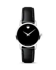 a black and silver watch with an oval face on a leather strap, isolated against a white background