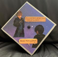 a graduation cap with two people talking to each other and one has a message on it