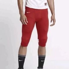 Mens Nike Red White Football Open Field 3/4 Pants Size: Xl Color: Red White Stripe Style: 615745 Condition: New With Tags Nike Red Sports Pants, Red Nike Sports Pants, Knee-length Sports Bottoms With Pockets, Red Knee-length Bottoms With Pockets, Nike Sporty University Red Bottoms, Nike Sporty Bottoms In University Red, Red Sportswear Pants For Sports, Red Sportswear Pants With Pockets, Nike Sporty Red Bottoms