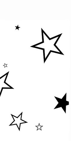 black and white stars are flying in the air