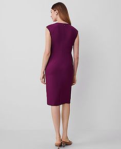 Elevate your wardrobe with the Ann Taylor Crew Neck Sheath Dress in the captivating Plum Burst color. This dress is meticulously designed to offer both style and comfort, making it perfect for transitioning from day to night effortlessly.

- **Size**: 10 (Regular fit)
- **Color**: Plum Burst
- **Material**: 66% Polyester, 28% Rayon, 6% Spandex; Lining: 100% Polyester
- **Gender**: Female
- **Features**:
  - Four-way stretch fabric that maintains shape and enhances fit
  - Elegant crew neck and c Petite Suits, Suit Dresses, Female Features, Sleeveless Suit, Shoe Wishlist, Semi Annual Sale, Blazer And Skirt, Suits For Sale, Ann Taylor Dresses