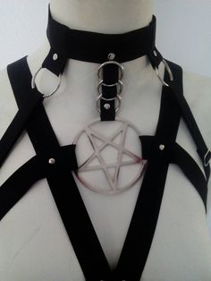 Elastic harness embellished with round studs and chains. Metal pentagram symbol is 8cm. Harness is Adjustable with regulators. my processing time ( time I need to make and ship this item ) is 2-3 weeks estimated delivery for : -USA : 3-4 weeks -Europe : 1-2 weeks there can be delays sometimes ,but that is not up to me ,it˙s up to postal service or customs ..message me if you don't receive your item in 6 weeks . Skeleton Spine, Pentagram Harness, Elastic Harness, Chest Harness, Art Outfit, Clothing Design Sketches, Time Time, Cosplay Diy, Emo Outfits