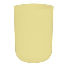 a yellow vase sitting on top of a white table