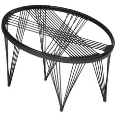 a black metal table with wire on it's legs and an upside down design