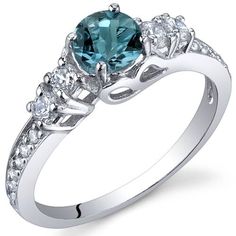 London Blue Topaz Ring Sterling Silver Round 0.5 cts SR9908 Side Blue Topaz Ring Sterling Silver, Jewelry Questions, Heart Promise Rings, London Blue Topaz Ring, Cubic Zirconia Rings, Swiss Blue Topaz, Emerald Engagement Ring, Blue Topaz Ring, London Blue Topaz