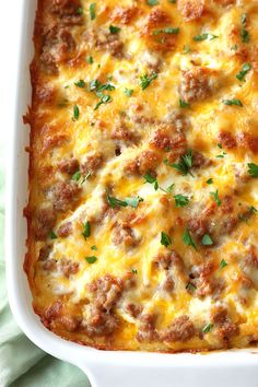 a casserole dish filled with meat and cheese