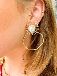 Enhance any occasion with our Taylor Shaye Pearl Sunburst Hoops. These lightweight, stunning earrings allow you to create a unique and stylish look. Perfect for pairing with any outfit, these hoops add a touch of elegance to your wardrobe. Elevate your style with these versatile and chic hoops. Pink Pineapple, Next Clothes, Stunning Earrings, The Pink, Favorite Outfit, Pineapple, Jewelry Earrings, Perfect Gift, Wardrobe