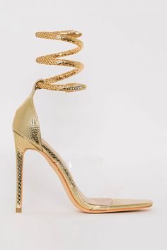 DESIGN FEATURES Fabric: Faux PU Leather Embellishment: Snake Strap Height Of Heel: High Heel (8cm) Appropriate Season: Summer Size Chart   EU Size  Length(MM)   35  225   36  230   37  235   38  240   39  245   40  250   41  255   42  260 Party Sandals With Clear Strap And Pointed Toe, Party Heels With Clear Strap And Open Toe, Glamorous Party Sandals With Clear Strap, Gold Heels With Clear Strap For Spring, Elegant Party Sandals With Clear Strap, Party Heels With Clear Strap, Gold Heels With Clear Strap For Evening, Party Heels With Heel Strap In Clear Color, Clear Heels With Heel Strap For Party