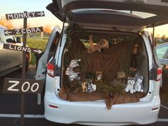 there are many stuffed animals in the back of this van