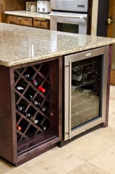 a wine rack in the middle of a kitchen island