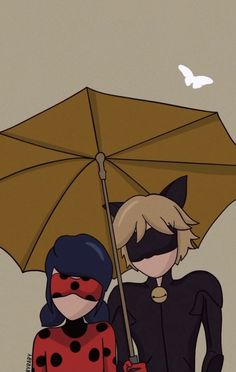 two people dressed up as ladybug and catwoman under an umbrella