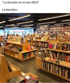 a library filled with lots of books on top of wooden shelves next to each other