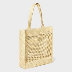 Flaunt a stylish look as you head out to the park or on a casual date by carrying this Crochet Tote Handbag from Universal Thread™. This solid-color paper crochet handbag has an unstructured shape with an open compartment to offer plenty of space for your wallet, notebook, phone and other belongings. Plus, you can carry it on your shoulder or in hand using the double handles. Universal Thread™: Found exclusively at Target. Lightweight Natural Rectangular Shoulder Bag, Natural Lightweight Rectangular Shoulder Bag, Lightweight Cream Rectangular Bag, Lightweight Beige Crochet Bag Rectangular, Lightweight Cream Tote Bag, Cream Lightweight Tote Bag, Casual Natural Beach Bag With Top Carry Handle, Trendy Everyday Open Weave Beach Bag, Trendy Rectangular Crochet Bag With Open Weave