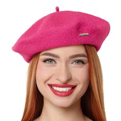 a woman with red hair wearing a pink hat