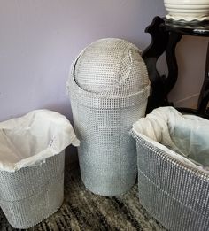 three wicker baskets sitting next to each other