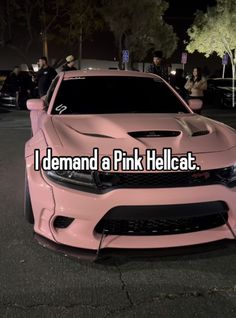 a pink car with the words i demand a pink hellcat