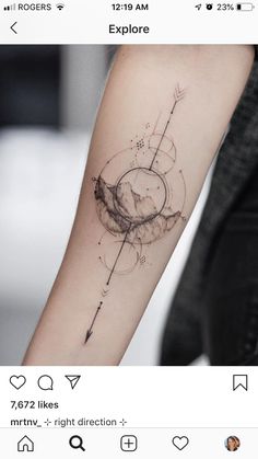 a person with a tattoo on their arm that has an arrow in it and the words explore