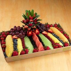 a box filled with lots of different types of fruit