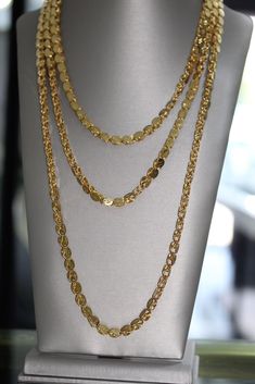 Elevate your style with the captivating allure of our 21K Gold Halabi Chain. This extraordinary piece boasts a unique and intricate chain design, meticulously crafted to accentuate your individuality. With its three layers cascading gracefully, this chain becomes a mesmerizing embodiment of sophistication and refined elegance. Make a bold statement and adorn yourself with this exquisite masterpiece, a true reflection of your distinctive taste and penchant for unparalleled beauty. 56.36g Luxury Gold Necklaces In German Silver, Luxury Necklaces With Stone Work For Eid, Luxury Gold Necklaces With Mirror Work, Gold Multi-strand Chain Necklace In Luxury Style, Luxury Gold Multi-strand Chain Necklace, Luxury Multi-strand Gold Chain Necklace, Luxury Double Chain Necklace For Party, Luxury Gold Double Strand Chain Necklace, Luxury Double Strand Gold Chain Necklace