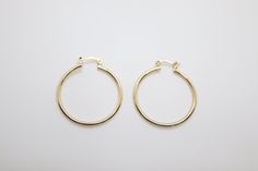 These sparkling, shiny gold earrings are beautiful and comfortable to wear with everything. These stunning earrings definitely makes a statement. Simple, elegant and stylish, these hoops will be forever in fashion and will compliment any outfit. The classic hoop earring never goes out of style! They are gold plated, light weight making them easy to wear. Enjoy! Tyler Childers, Gold Hoop Earring, Large Hoop Earrings, Stunning Earrings, Simple Elegant, Gold Hoop, Tennis Bracelet, Gold Hoop Earrings, Christmas Sale