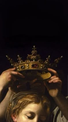 a woman with a crown on her head is looking down at the viewer's eyes