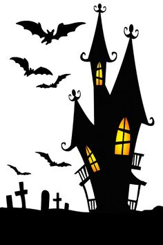 a halloween house with bats flying over it