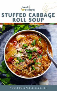 a bowl of stuffed cabbage soup with parsley on top and the words stuffed cabbage roll soup above it